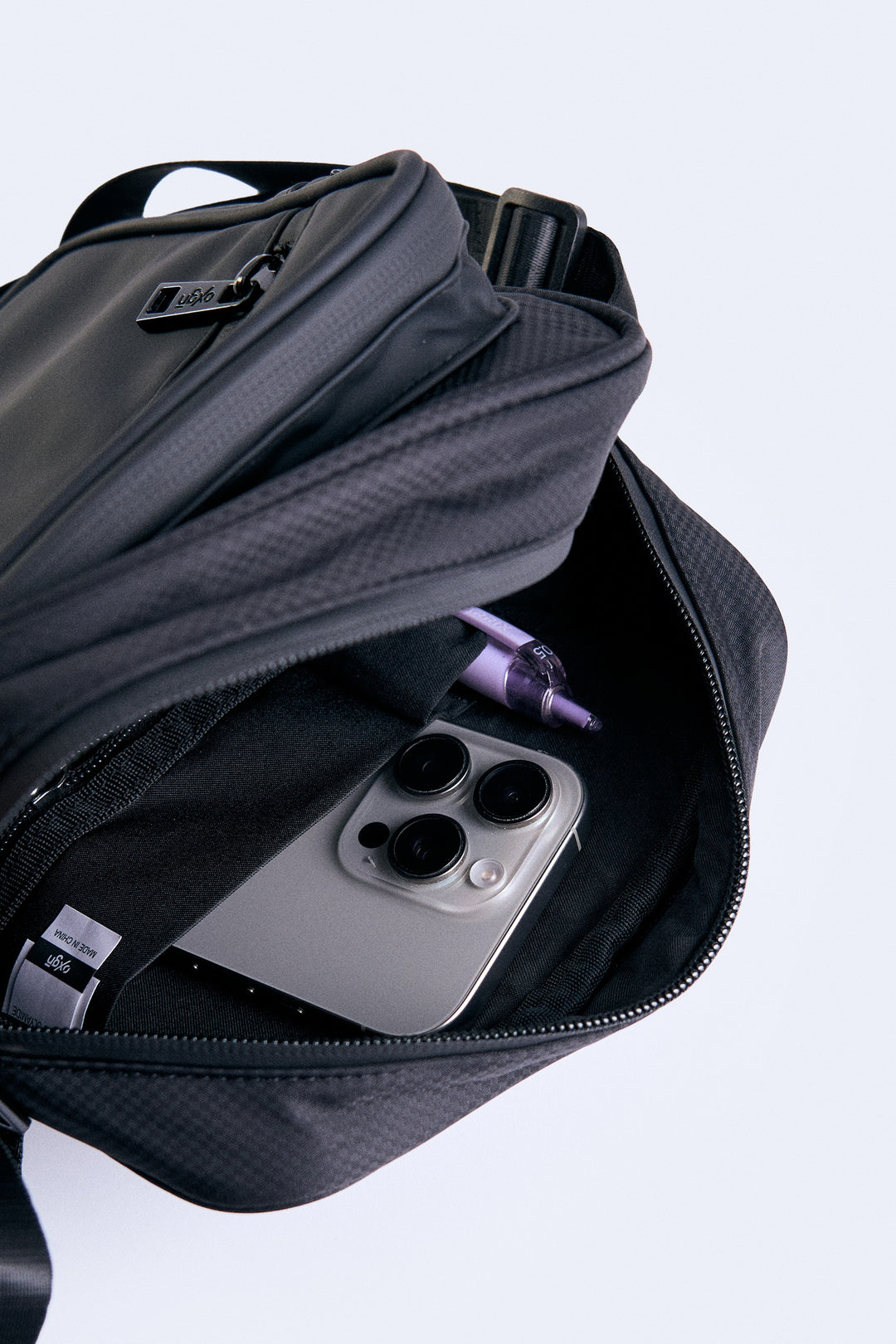 Multi Compartment Water Repellent Sling Bag