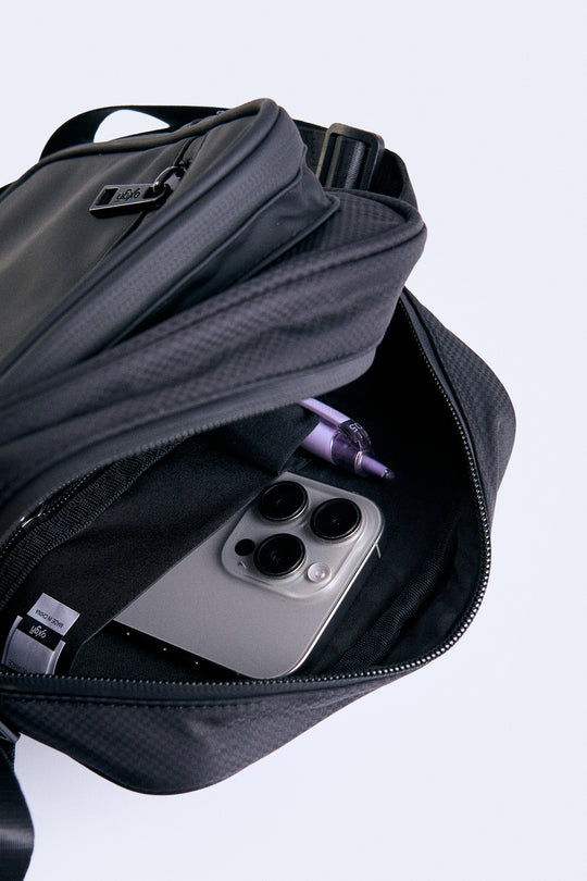 Multi Compartment Water Repellent Sling Bag